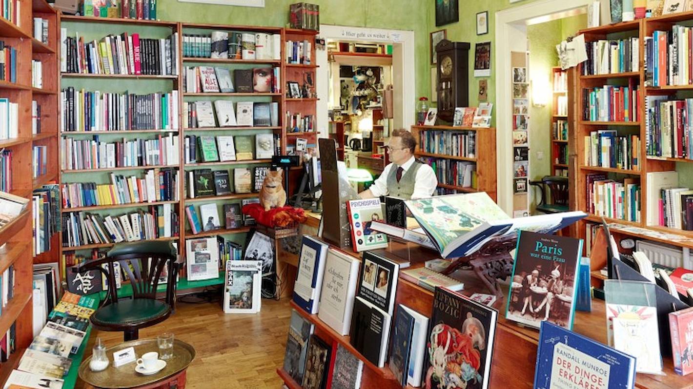 Jörg, the owner of Büchers Best, inside his bookshop